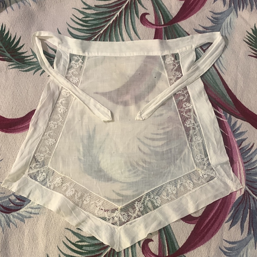 Antique batiste apron with lace insets.